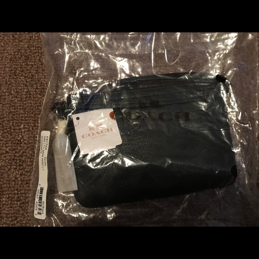 Black leather coach wristlet
